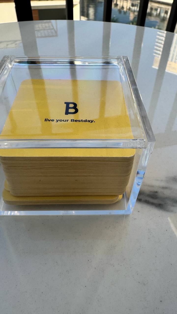 Bestday Topics card deck in acrylic box on marble table